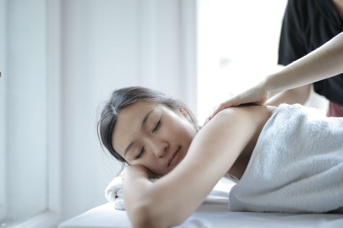 Woman resting during a shoulder massage